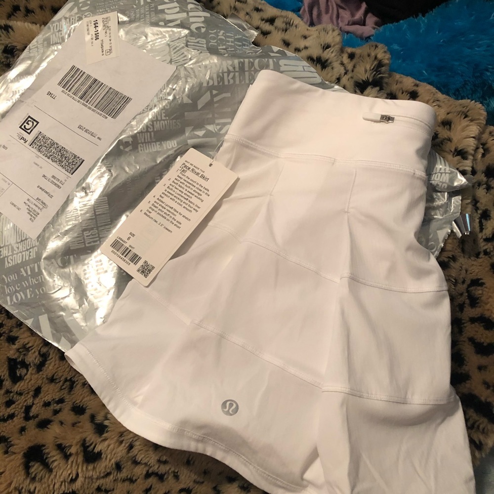Brand new white lululemon pace rival skirt tall!